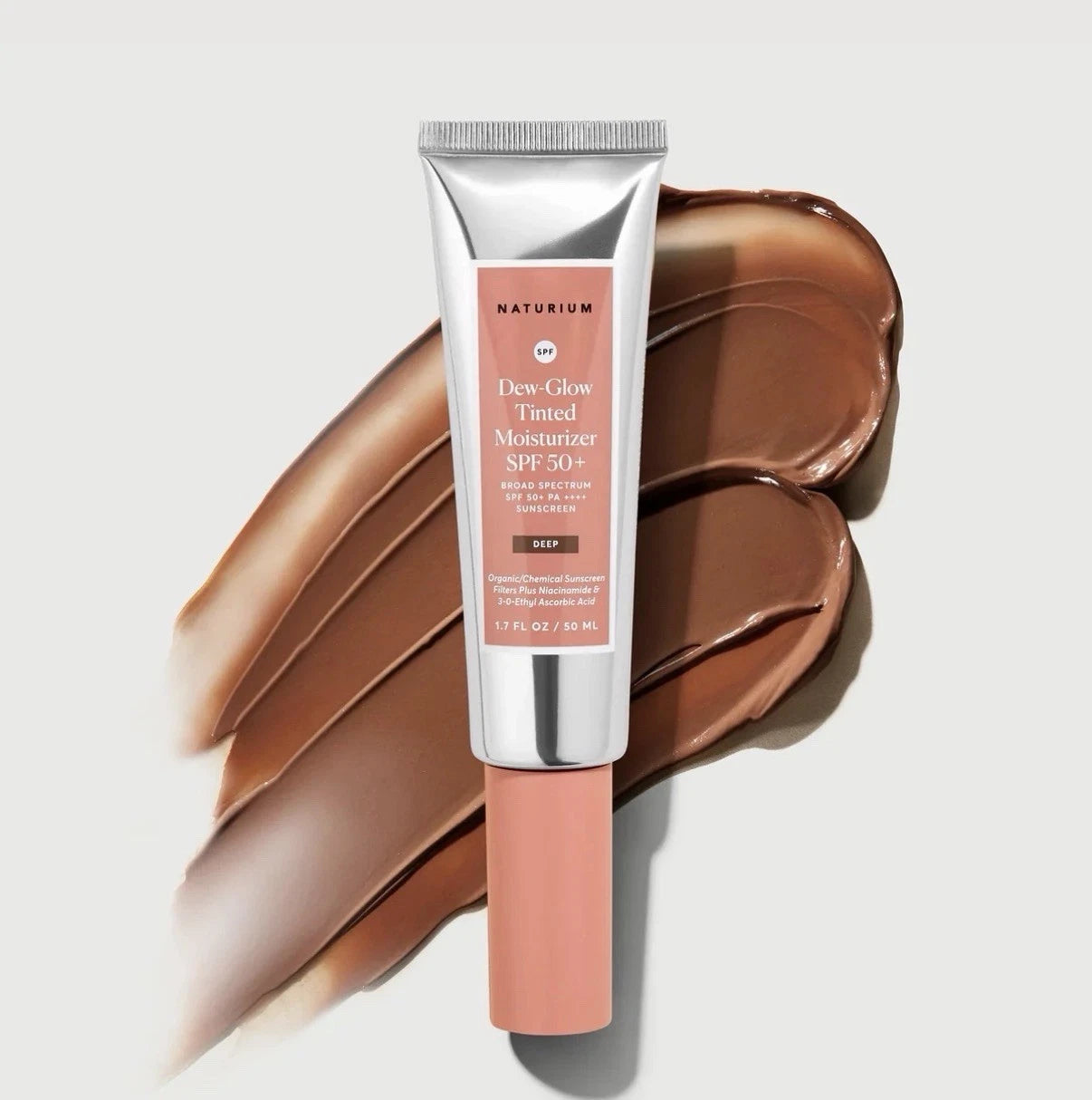 Naturium Dew Glow Tinted Moisturizer SPF 50+ Deep - 50ml | Discover skin care, face cream, lip gloss, sunscreen, and korean skin care products at Sapphire Beauty Booth— a trusted cosmetic shop near me and makeup store near me.